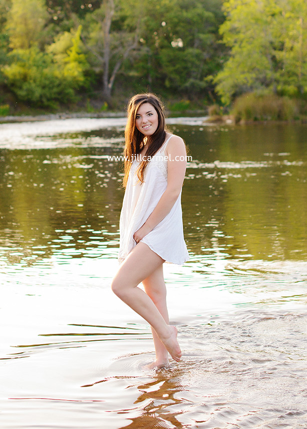 splashing in the american river for graduation pictures