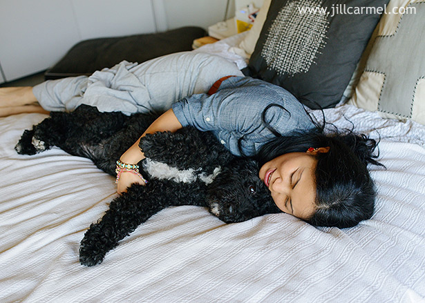 cuddles with portuguese water dog milou