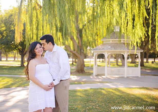 pregnancy pictures with mom and dad in front of gazebo in elk grove