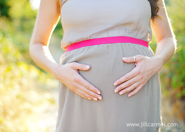 belly picture with hands for pregnancy maternity session