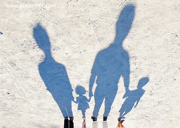 having fun with shadows for their grandparent portrait session