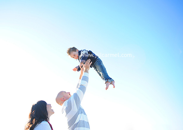 having fun at the beach in San Francisco for family portraits