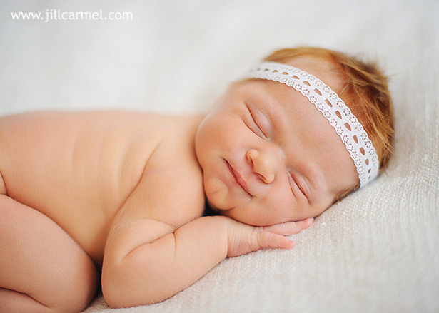 lacy headband on red-headed newborn baby in los angeles