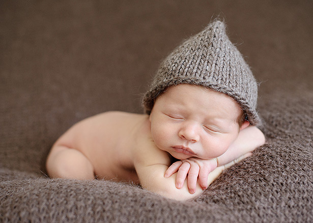 knitted woolen hat on baby boy for his natural light studio portraits
