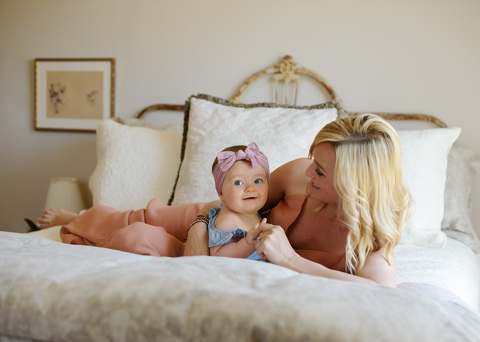 Baby and mom on bed