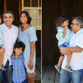 Family portrait with wooden window background at Folsom Powerhouse