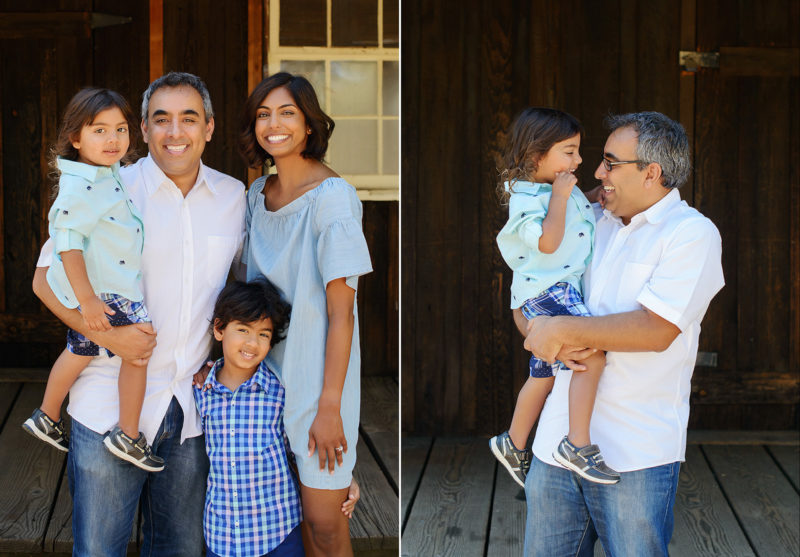 Family portrait with wooden window background at Folsom Powerhouse