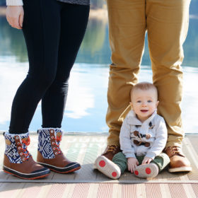 Baby Boy Wearing Boots by Parents Feet by Pollock Pines Lake