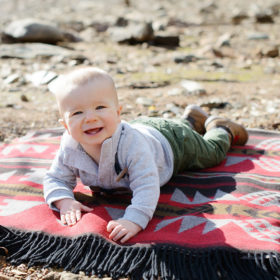 Baby Boy Smiling on Southwest Print Blanket by Pollock Pines Lake