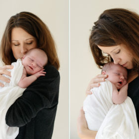 Mom and New Baby Snuggle and Smile in Front of White Background