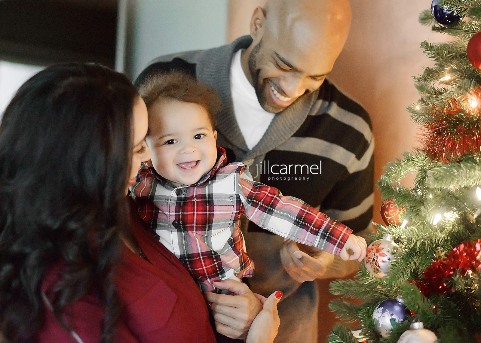 Vince and Sondi Carter with Baby Boy and Christmas Tree