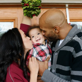 Vince and Sondi Carter Under a Mistletoe with Baby Boy