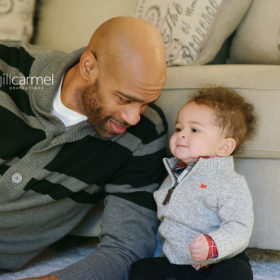 Vince Carter with Baby Boy on Couch