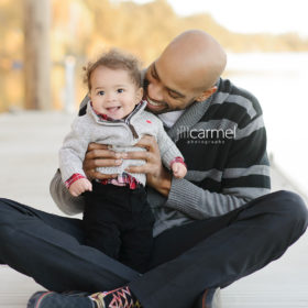 Vince Carter with Baby Boy Sitting at the Dock