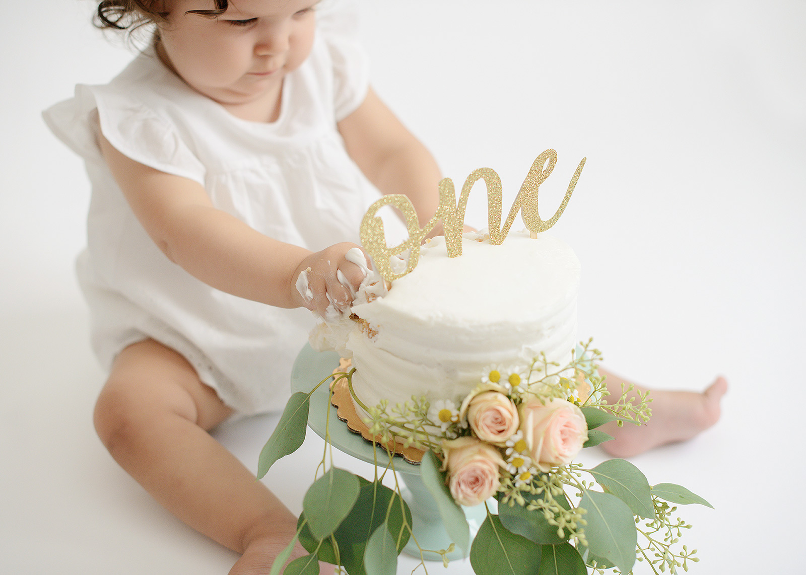 Baby Girl One Year Cake Smash with Flowers