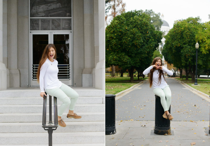 Senior girl sitting on stair rails in Sacramento State Capitol
