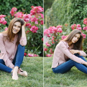 Senior girl sitting on grass with pink flowers in background in State Capitol