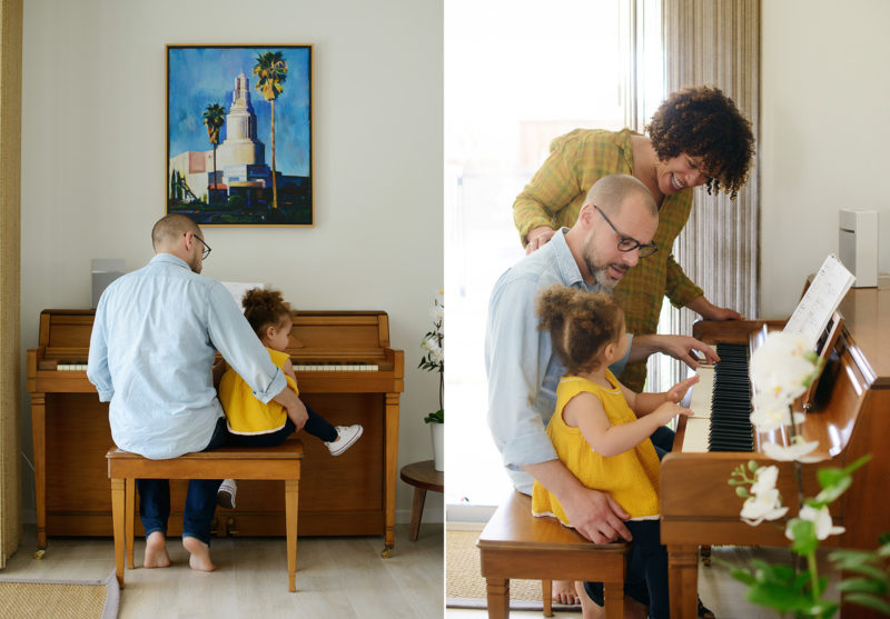 Mom and dad play piano with daughter wearing yellow in home
