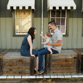 Family photo sitting down in Old Sacramento