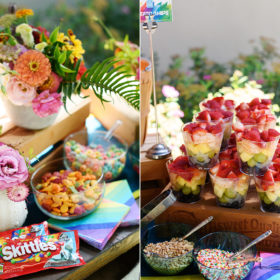 First birthday party rainbow food spread with skittles, goldfish, sprinkles, fruits, cereal