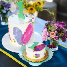 colorful feather 1st birthday party cake