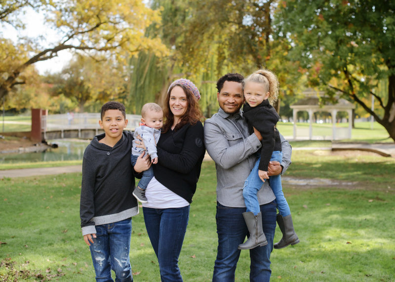 Mixed race Fall family photo outdoors in Sacramento