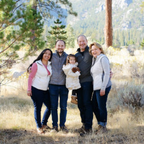 Fall family session outdoors in woods with golden grass in Nevada