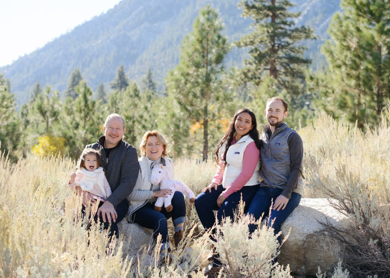Family photo in great Nevada outdoors with pine trees in background