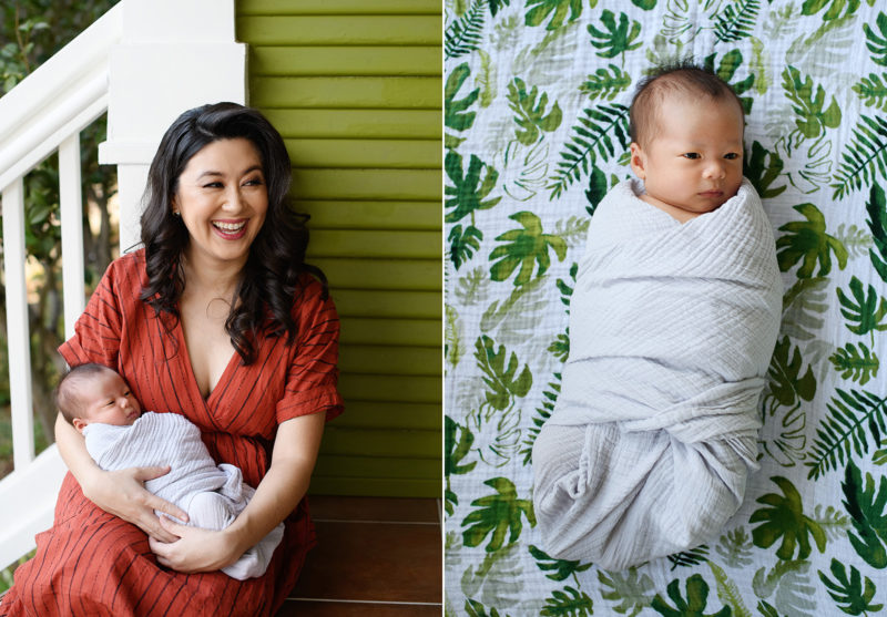 Mom holding newborn baby girl smiling and newborn baby girl swaddled against botanical blanket