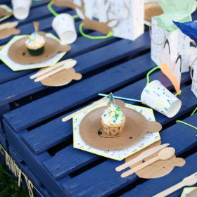 Detail of paper plate setting with teepees and bear plates