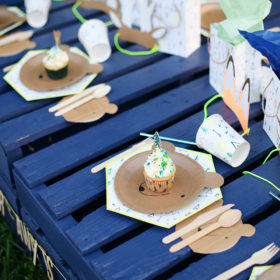 Detail of paper plate setting with teepees and bear plates