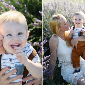 One year old boy smiling as mom gives him a kiss in lavender field