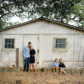 Family photo in whitewashed wooden shed in Quarryhill Botanical Garden Sonoma