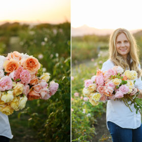 Woman holding bouquet of yellow and pink roses in the middle of flower farm in Sacramento Valley