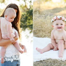 Baby girl naked as mom holds her and wearing a flower crown on blanket in Folsom