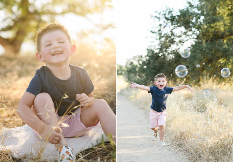 Little boy smiling during sunset and chasing bubbles in Folsom