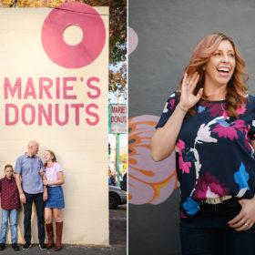 Family hugging and smiling in front of Marie’s Donuts sign. Mom playfully laughs in front of Freeport Bakery storefront mural in Sacramento