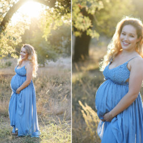Pregnant woman wearing blue dress in natural light under an oak tree