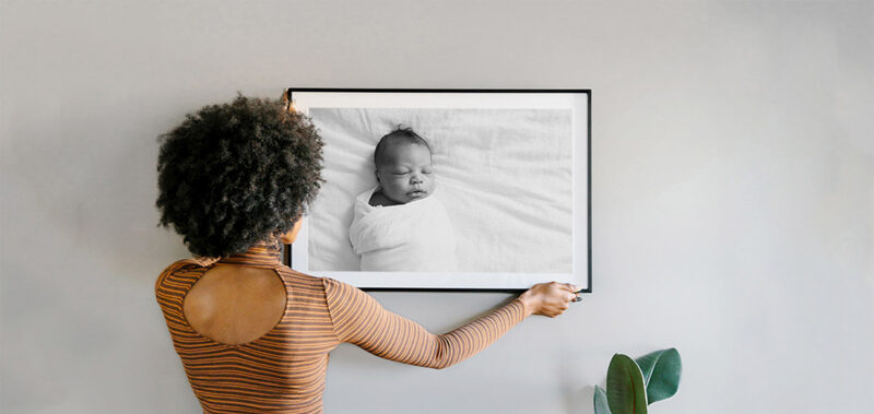 choose large frames or prints to fill the walls of your home