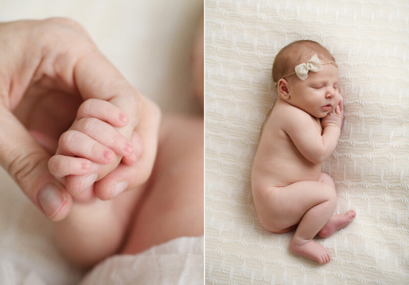 Close up of newborn baby girl's hands holding fingers and curled up on blanket