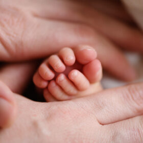 Close up of newborn baby toes in Sacramento studio