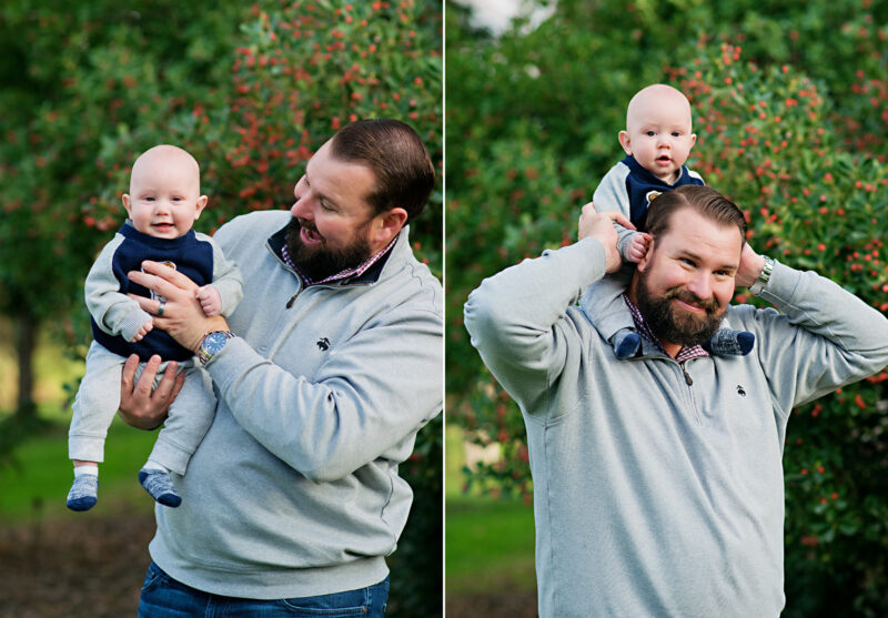 Dad holds baby son on shoulders and smiles at camera outdoors in Davis