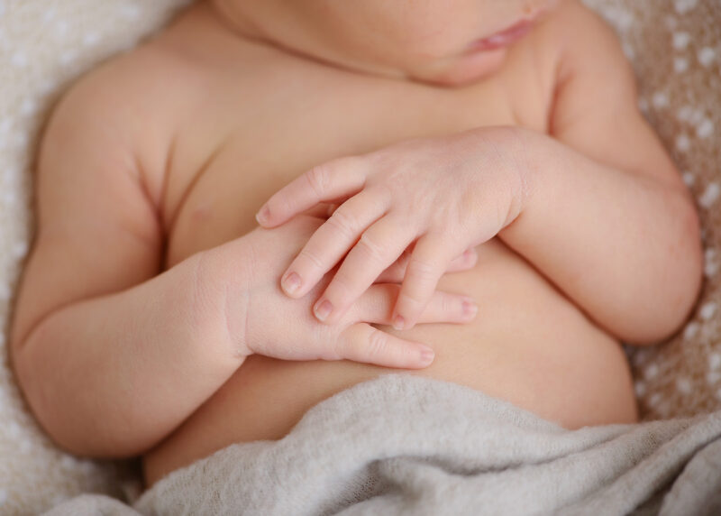 Newborn baby close up of hands clasping each other in Sacramento studio