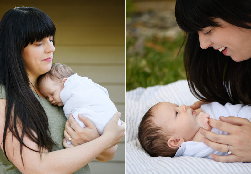 Mom holds newborn baby brother and looks at him lovingly on blanket in Sacramento backyard