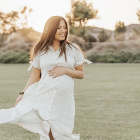 The Nines by Hatch by Target maternity dress worn by pregnant woman in grassy field