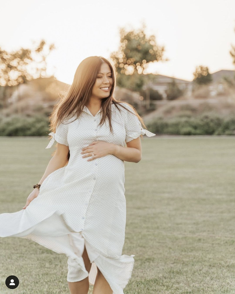 The Nines by Hatch by Target maternity dress worn by pregnant woman in grassy field