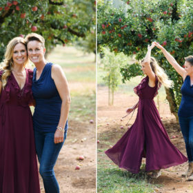 Two moms smiling and twirling for the camera in Apple Hill apple orchard