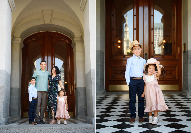 Family posing in front of Sacramento State Capitol building with kids wearing hats