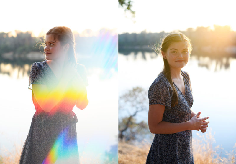 High school senior girl by Folsom lake in sunlight lens flare