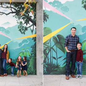 Father and son take a picture in front of wide open wall mural in Sacramento
